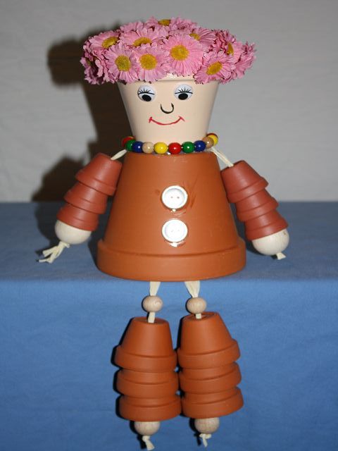Tontpoffigur " Blumenkind "